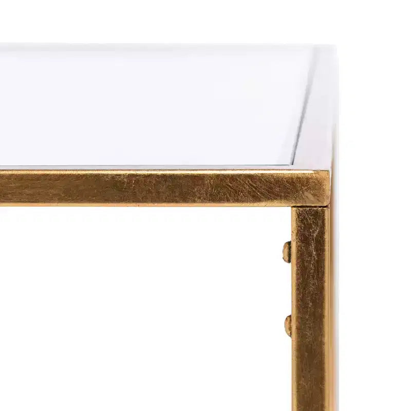 Table basse ronde avec plateau en verre et piètement en X