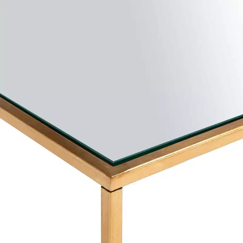 Table basse ronde avec plateau en verre et piètement en X